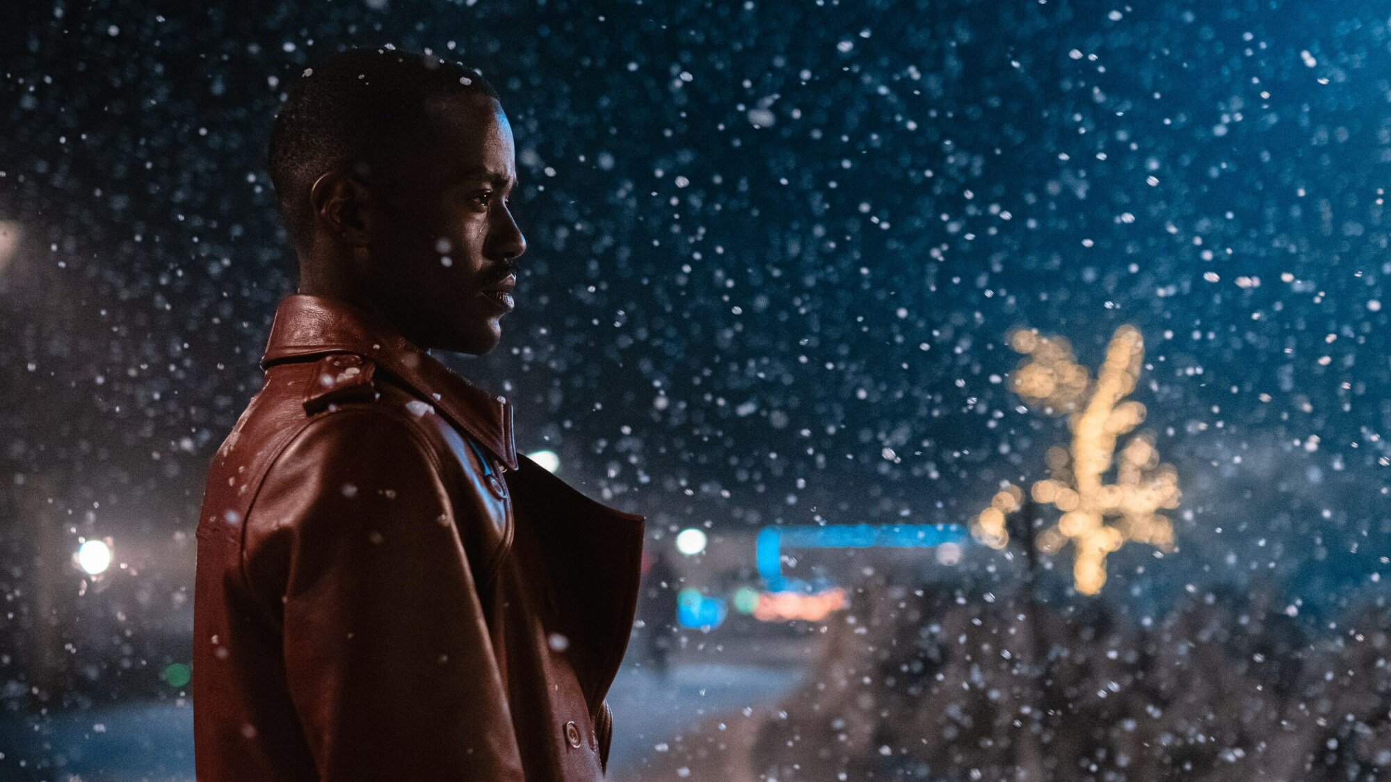 The Doctor (Ncuti Gatwa) stands in the snow. 