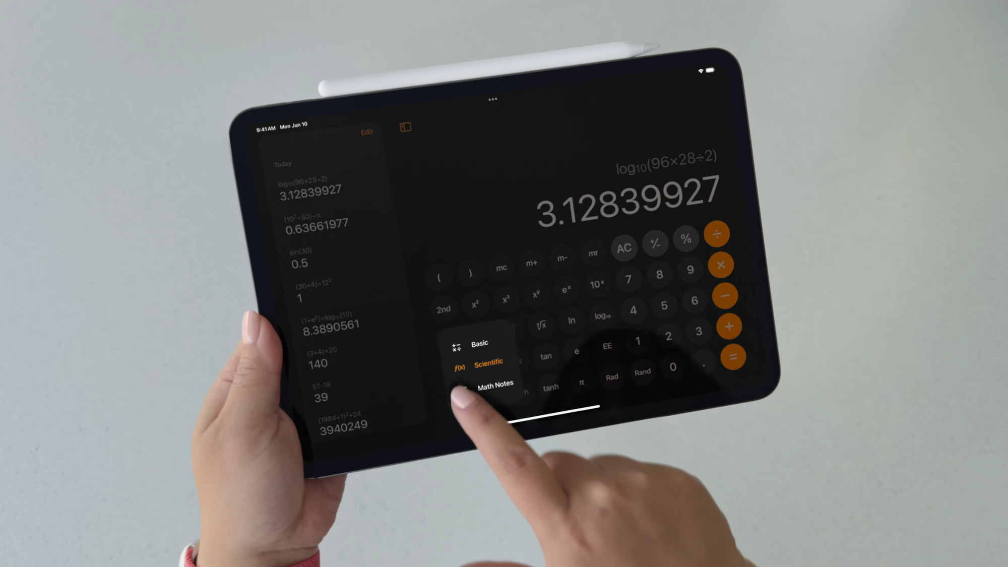 Woman using the Math Notes feature in iPadOS 18