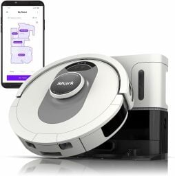 the shark ai ultra robot vacuum stands up on its charging base 