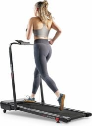 woman running on Sunny Health and Fitness treadmill