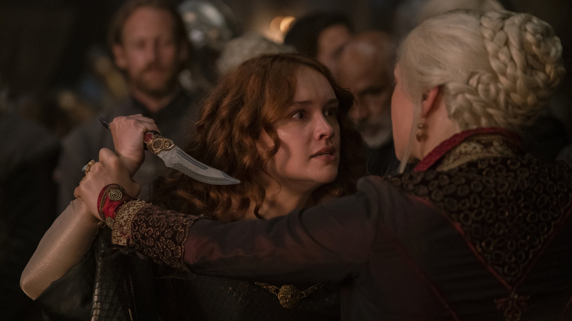 Olivia Cooke as Alicent Hightower, lunging with a dagger, in "House of the Dragon"