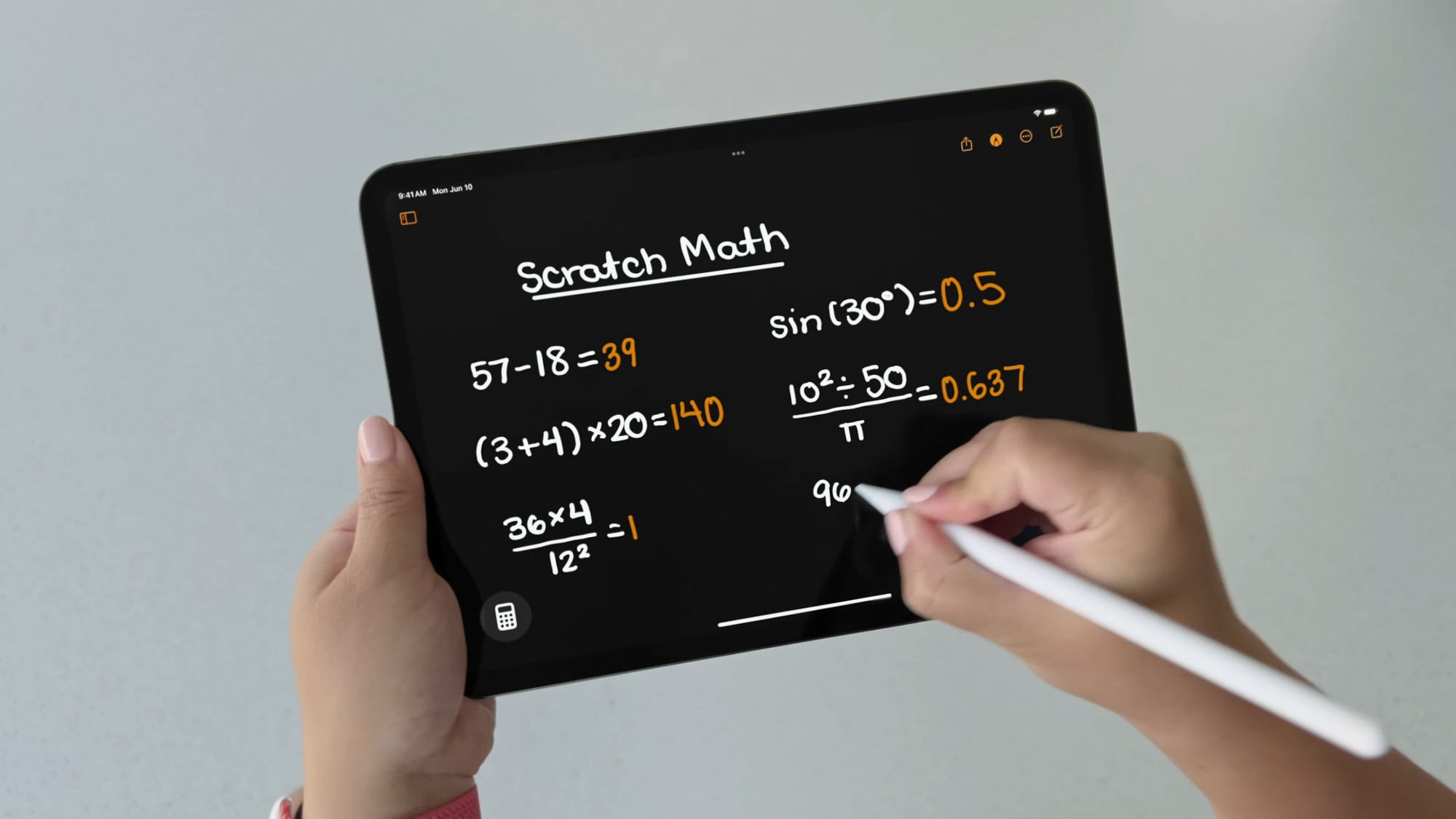 Woman using the Math Notes feature in iPadOS 18