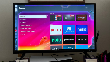 TV screen showing the Roku home page.