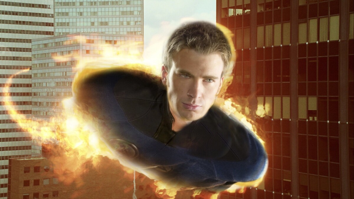 A burning Johnny Storm flies past skyscrapers.