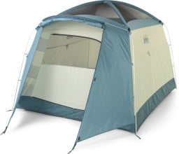 a blue and cream-colored REI tent on a white background