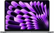 Apple MacBook Air laptop with purple and black screensaver