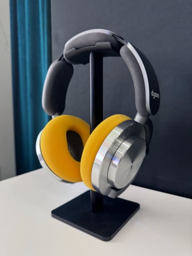 Dyson onTrac headphones with yellow ear cushions