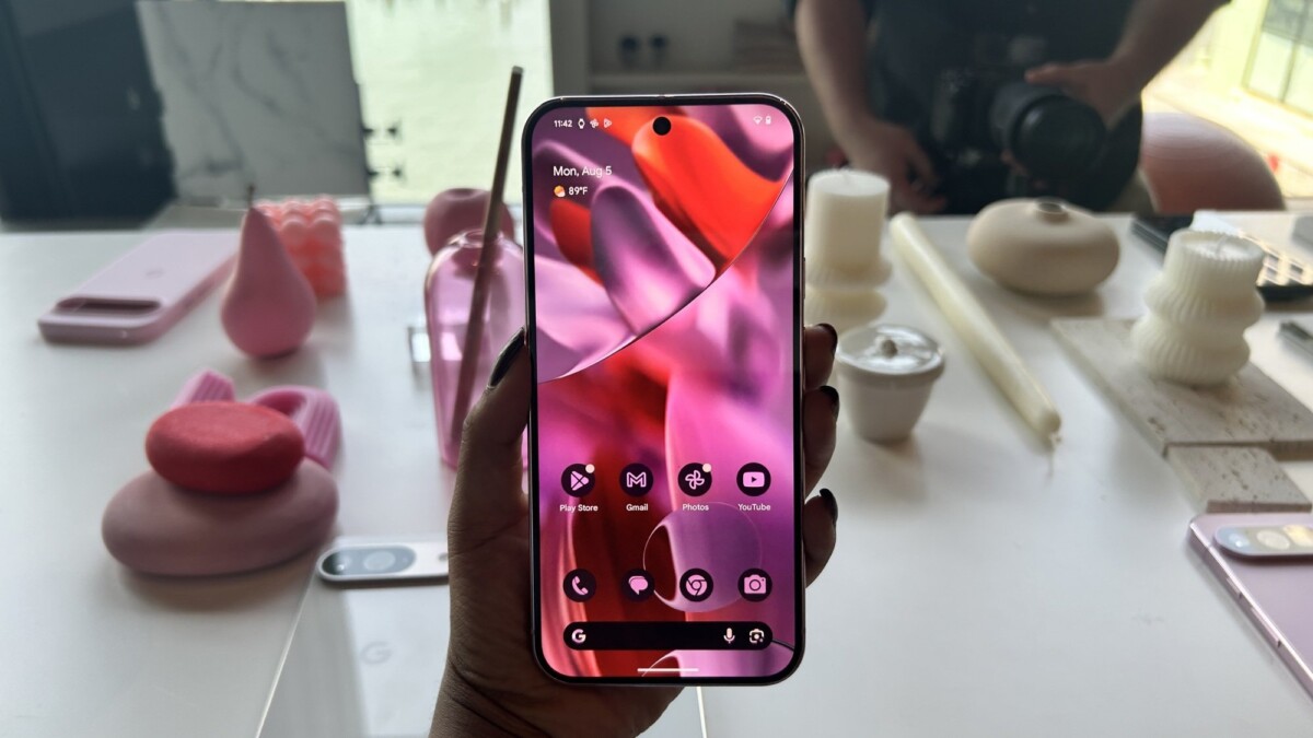 Woman holding Pixel 9 Pro XL