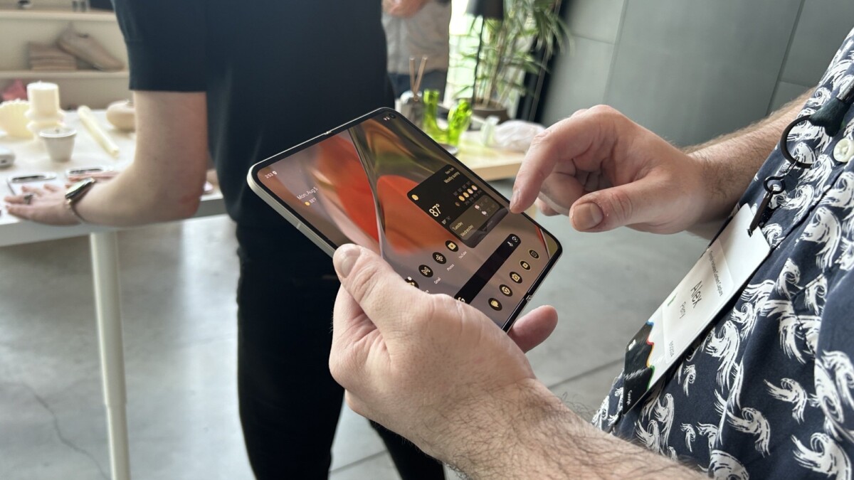 man holding pixel 9 pro fold open in tablet mode