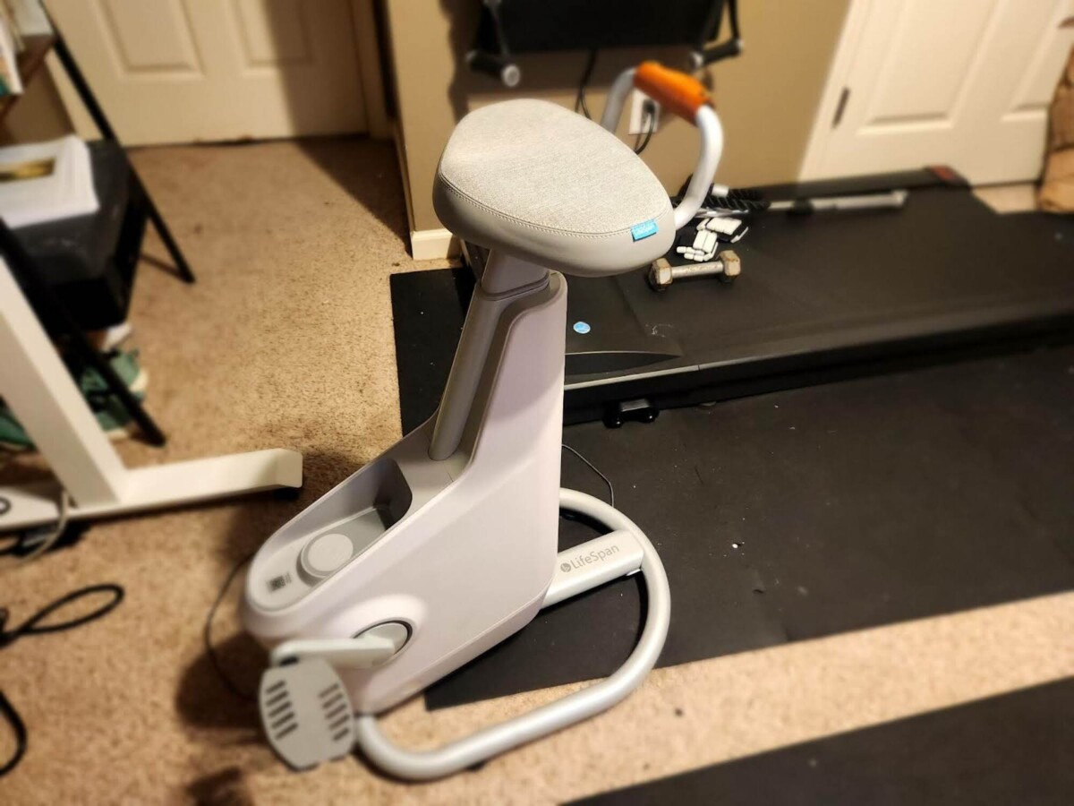 backless exercise bike at standing desk setup