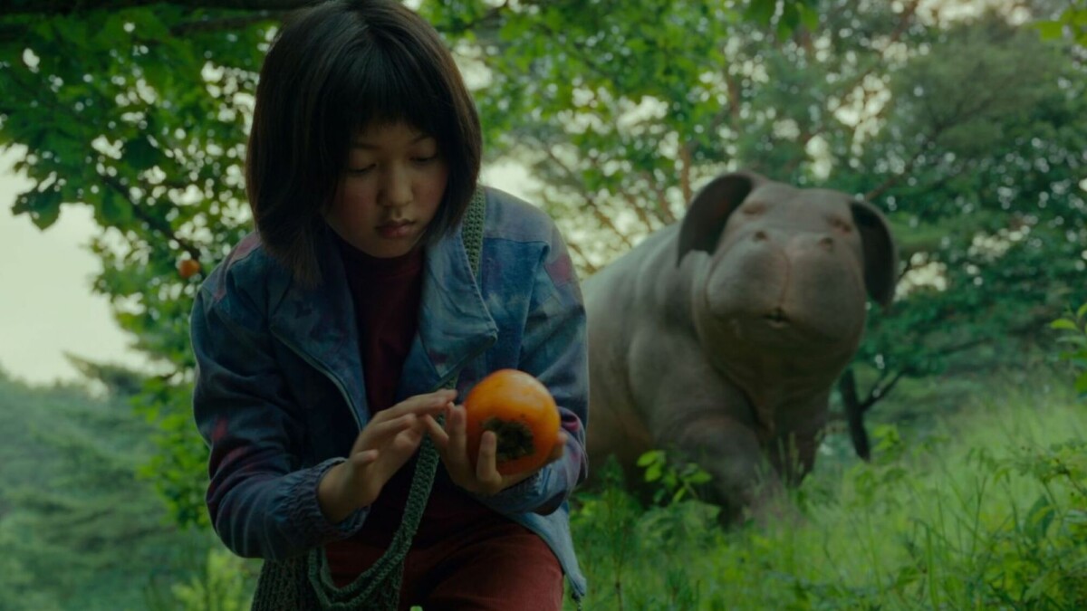 A girl and her pet, an enormous pig