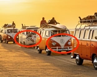 close up of imagen 3 generated image of a parade of Volkswagen busses driving on a beach at sunset