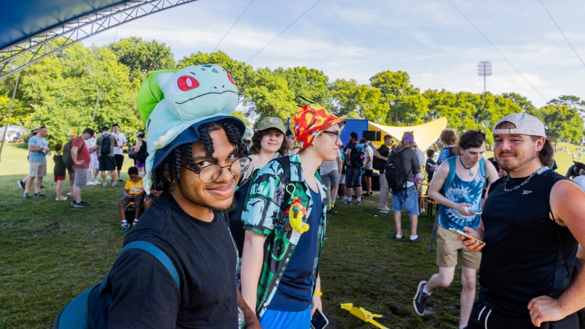 A man in a Bulbasaur hat at Pokémon GO Fest.