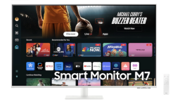 Samsung monitor with streaming apps on screen and remote beside it