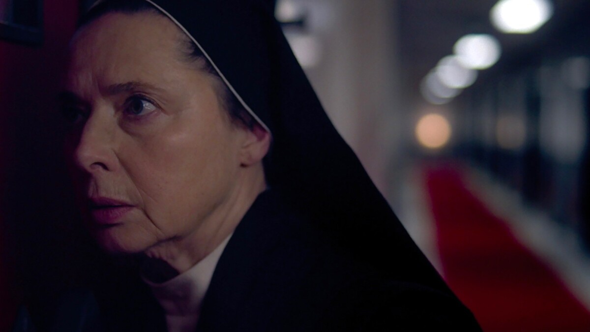 Isabella Rossellini as Sister Agnes snoops in "Conclave."