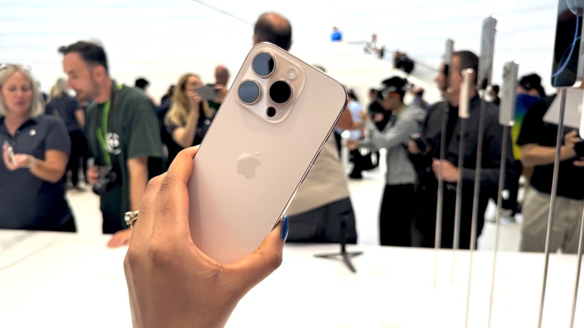 iPhone 16 Pro model in a woman's hands