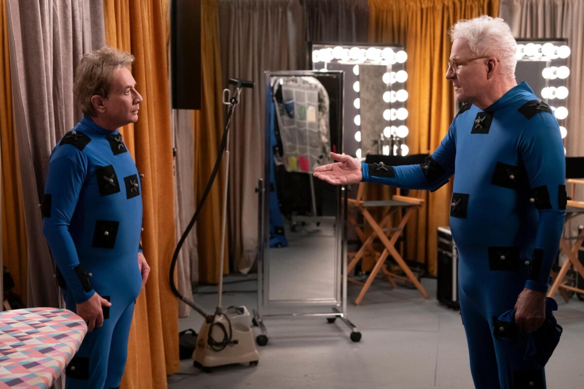 Martin Short and Steve Martin stand facing each other in mo-cap suits in "Only Murders in the Building."