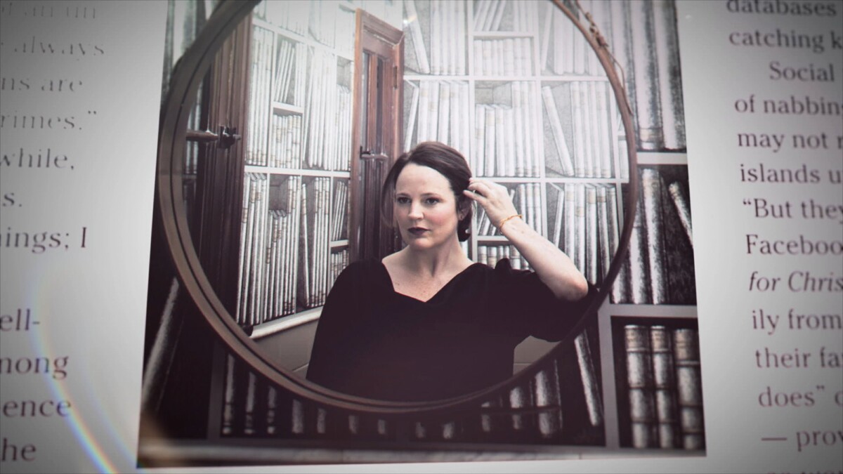 Michelle McNamara looking at herself in a mirror