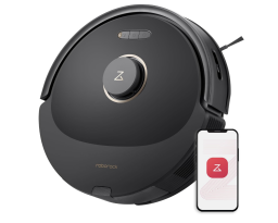 robot vacuum beside phone