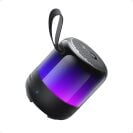 a soundcore portable speaker illuminated in blue and purple