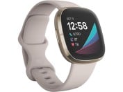 Fitbit Sense smartwatch with off white band and gold case