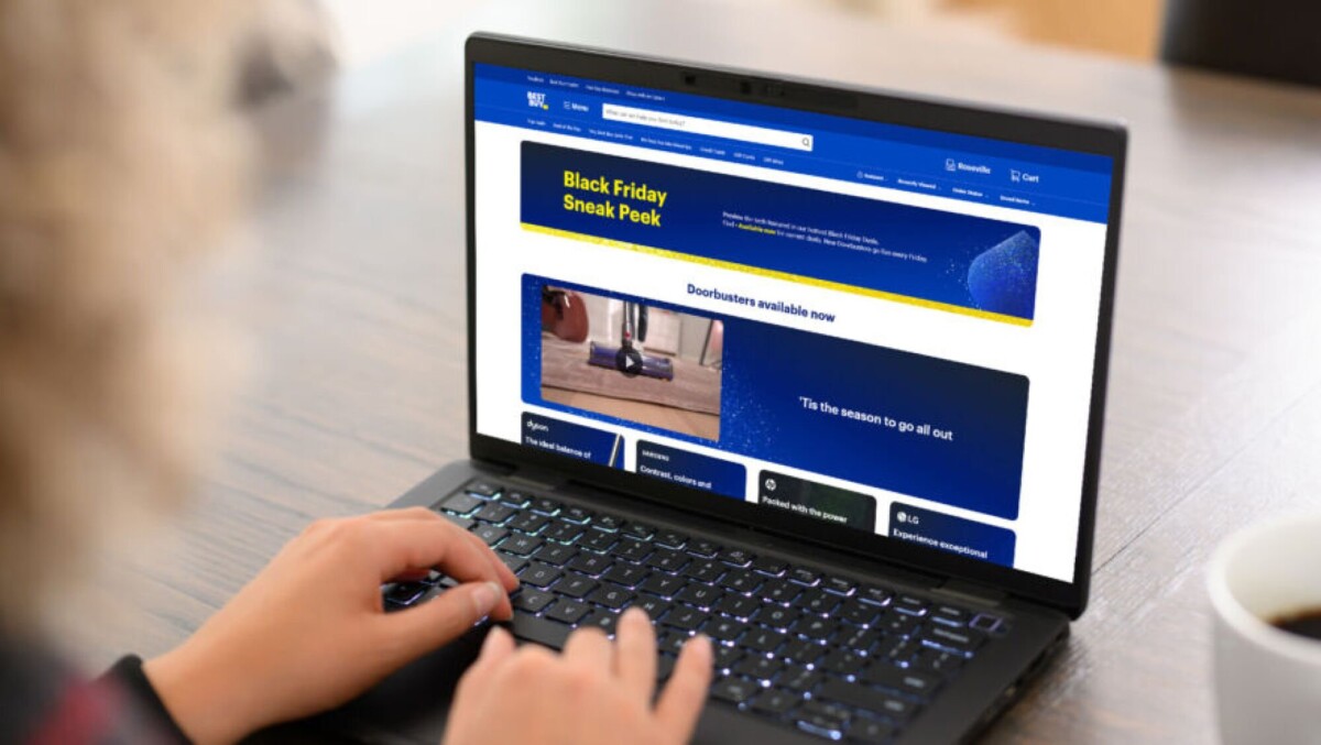 a close-up of a woman browsing deals on best buy's Black Friday Sneak Peek hub