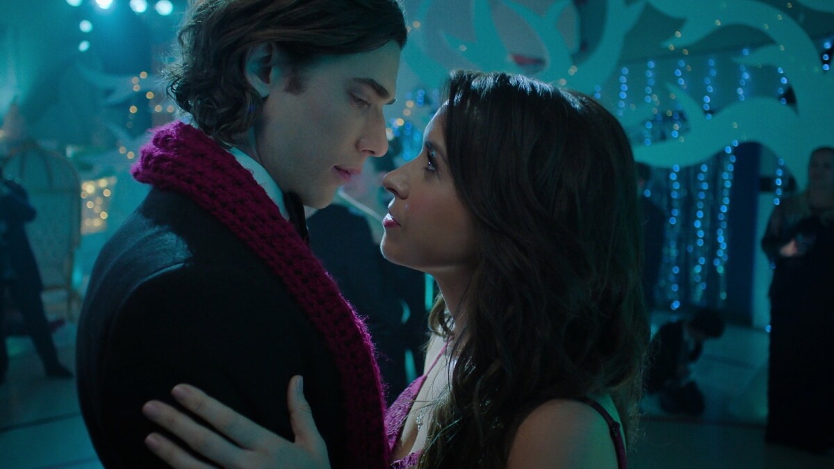 Lacey Chabert and Dustin Milligan get close in "Hot Frosty."