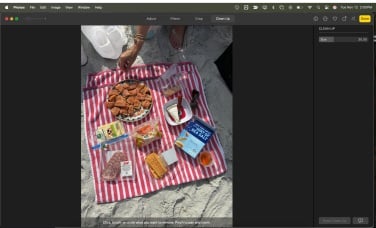 photo of a beach picnic with sneakers highlighted to be removed