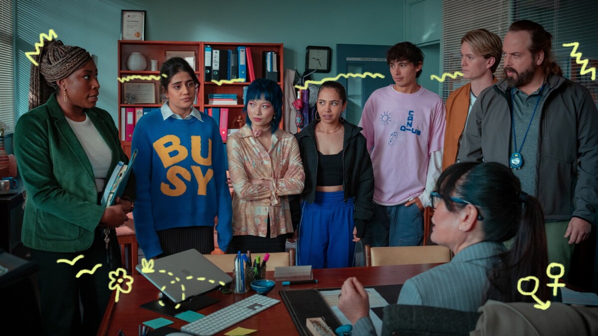 (L to R) Chika Ikogwe as Jojo, Ayesha Madon as Amerie, Gemma Chua-Tran as Sasha, Sherry-Lee Watson as Missy, Brodie Townsend as Ant, Bryn Chapman Parish as Spider, Angus Sampson as Voss in "Heartbreak High" Season 2.