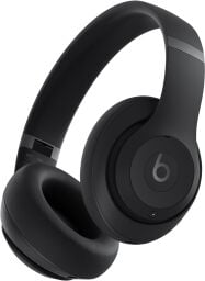 Black Beats Studio Pro over-ear headphones appear on white.