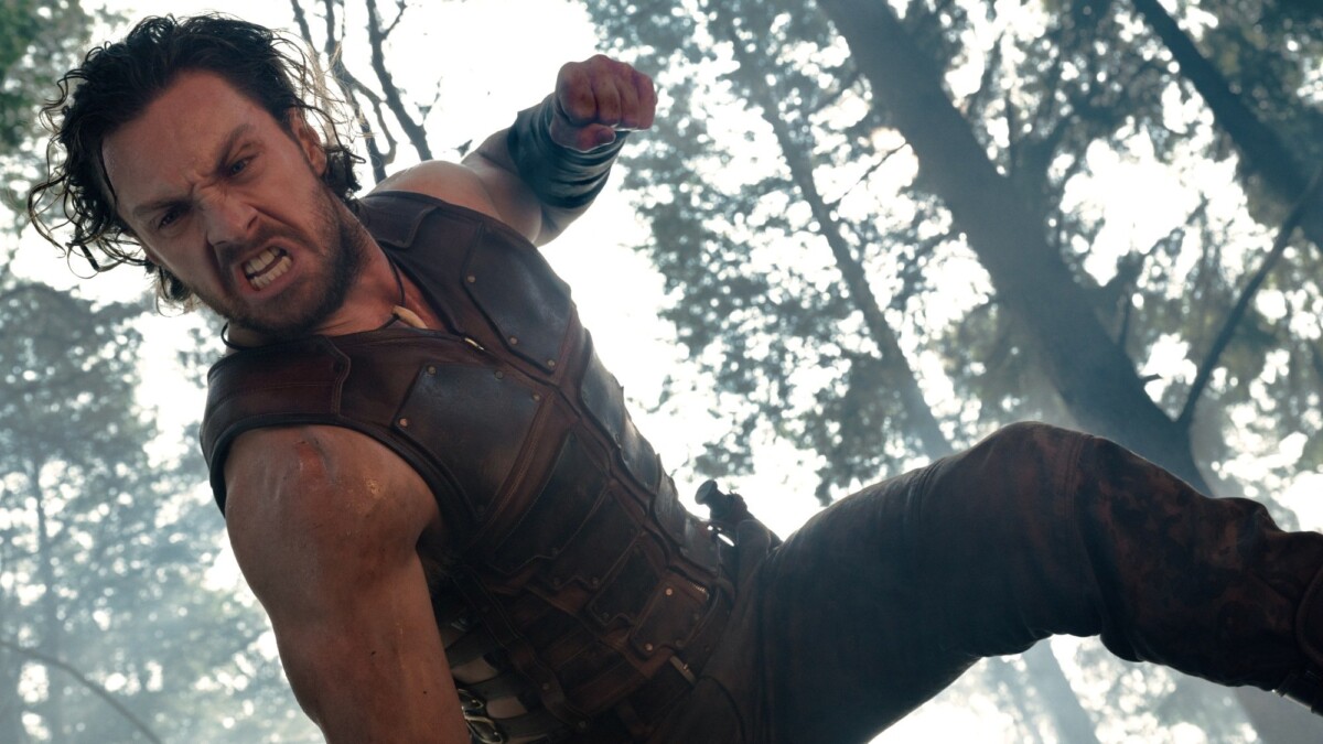 Aaron Taylor Johnson readies to punch something in "Kraven the Hunter."