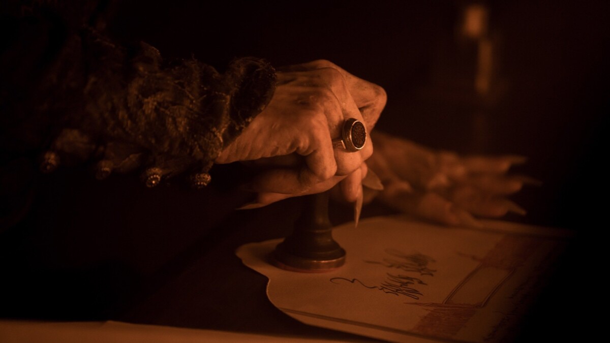 Count Orlok stamps a contract in "Nosferatu."