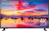 a 55-inch insignia TV displaying a marina with sailboats at sunet